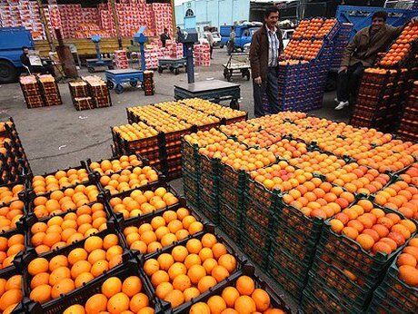 توزیع میوه‌های تنظیم بازاری شب عید در برخی پایگاه‌‌های بسیج